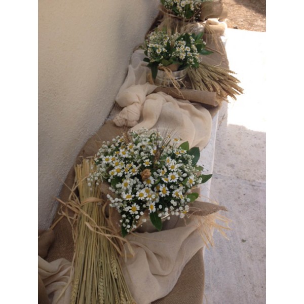 Vintage church baptism decoration with cornflowers and chamomile
